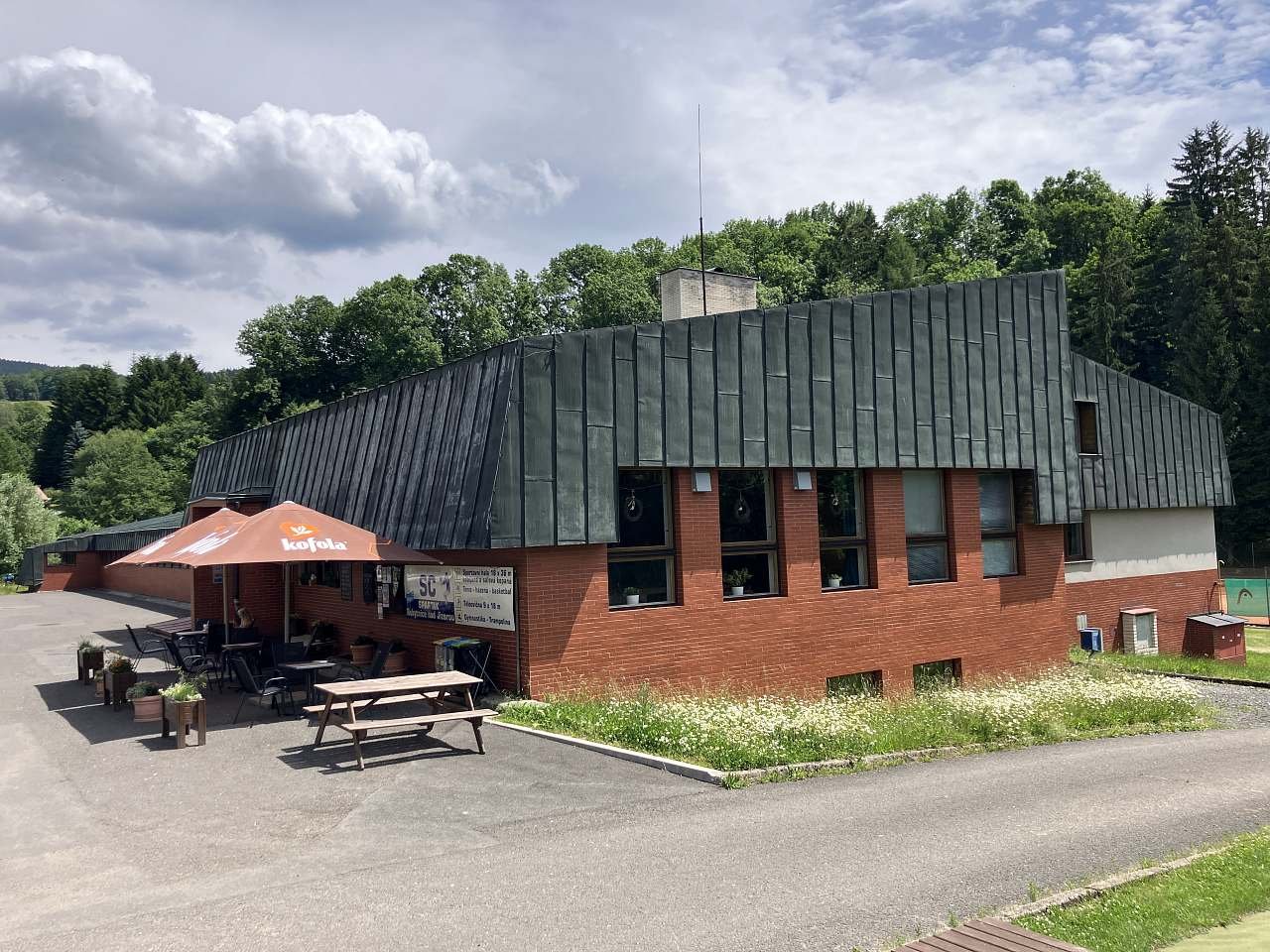 Apartmány ve sportovní hale