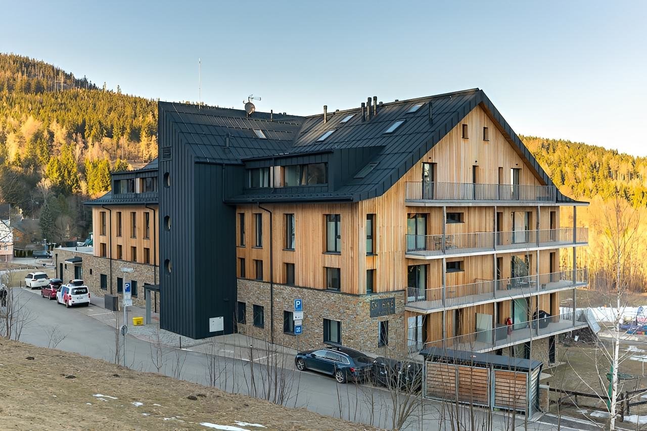 Budova Ski&amp;Bike Apartments